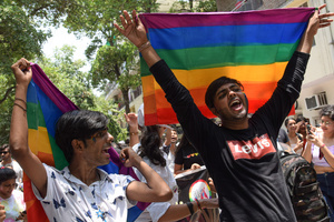 Participants can be seen with a Pride Flag in a Pride March to celebrate Pride Month and spread awareness regarding the LGBTQ+ Community in New Delhi.