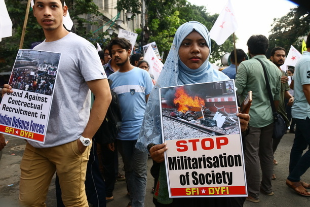 Activists of the DYFI (Democratic Youth Federation of India) and SFI (Students' Federation of India) hold placards and shout slogans against the government's new Agnipath recruitment scheme for the army, navy, and air forces during a protest in Kolkata.