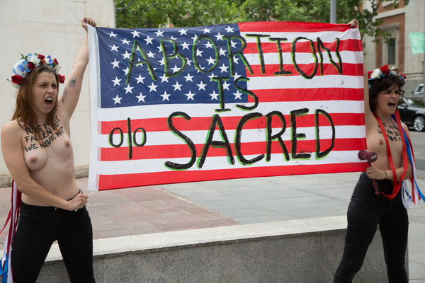 (EDITORS NOTE: Image contains nudity) FEMEN activists protest in favor of abortion at the US embassy in Madrid.