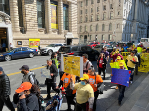 Hundreds of street vendors and their families took the streets of lower-manhattan, New York City this morning demanding better treatment for street vendors by the police department and city inspectors.