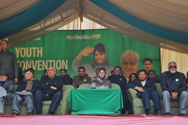 Peoples Democratic Party (PDP) President Mehbooba Mufti (C) along with other party senior leaders during youth convention at Sher-e-Kashmkir Park, in Srinagar on November 27, 2022