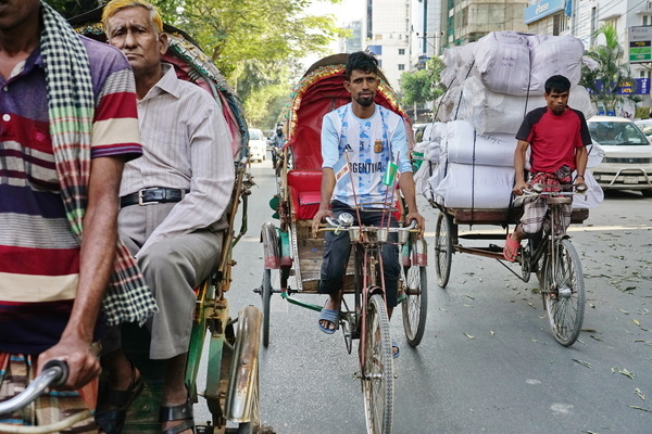 Low income people are working in Dhaka, Bangladesh
Wearing the jersey of the favorite team of World Cup football