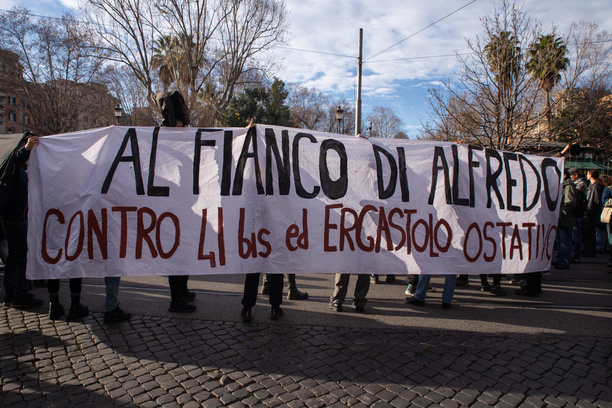 Demonstration in Rome organized by anarchists from Piazza Vittorio Emanuele to Largo Preneste in solidarity with anarchist Alfredo Cospito