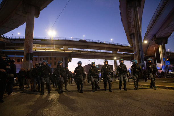 Policemen in Prenestina road during demonstration in Rome organized by anarchists in solidarity with anarchist Alfredo Cospito