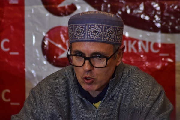 Former Chief Minister of Jammu and Kashmir state, Omar Abdullah gestures as he speaks during a press conference in Srinagar.