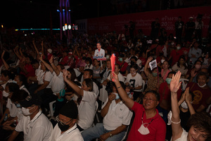 Supporters of the Pheu Thai Party, rally listen to the campaign and unveil Pheu Thai Party candidates for the House of Representatives in the Bangkok constituency at Stadium one, Banthadthong Road, Pathum Wan district, Thailand, on March 24, 2022.