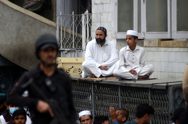 Pakistani Muslims perform the first Friday prayer in the holy month of Ramadan at Cantt Mosque.