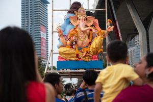 Devotees float a statue of Ganesha into the Chao Phraya River at Bhumibol Bridge, Rama 3 Road, on the last day of the 16th Shree Ganesha Festival in Bangkok, on September 24, 2023. organised by the Vishwa Hindu Parishad Association Thailand.