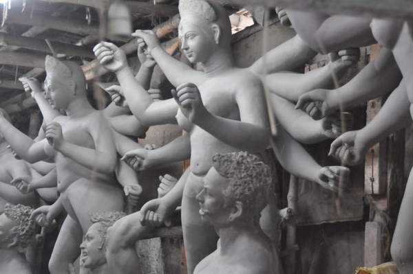 Kumartuli is a traditional potter's quarter in North Kolkata, West Bengal. These highly skilled sculptors preparing clay idols of Goddess Durga ahead of Durga Puja which is to be held in October. The world famous Kumartuli is a 300-year-old potter's settlement.