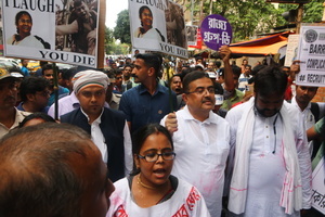Leader of the Opposition West Bengal Legislative Assembly and BJP Senior Leader Suvendu Adhikari together with the Congress leader Koustav Bagchi, and the aspirants for public jobs in West Bengal state take part in a protest rally to demand immediate recruitment for vacant posts.