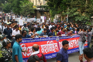 Aspirants for public jobs in West Bengal state take part in a protest rally to demand immediate recruitment for vacant posts.