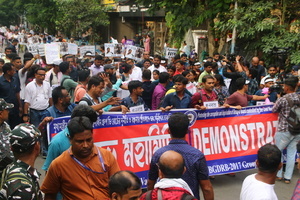 Aspirants for public jobs in West Bengal state take part in a protest rally to demand immediate recruitment for vacant posts.