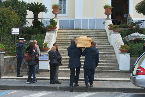 Casamicciola Terme, district of Ischia, men carry the coffin Antonella Di Massa, for the funeral, the woman was disperse in ischia, her body found after eleven day with a noose around the neck, the police investigate if is a case of murder or suicide.