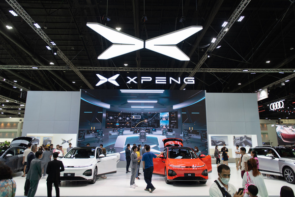 People look at XPENG Motors vehicle is displayed during the Bangkok International Motor Show at the IMPACT Exhibition and Convention Centre, Nonthaburi Province on March 29, 2024.