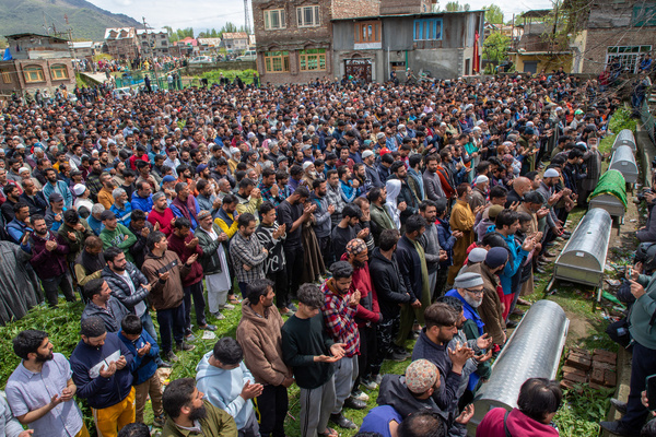 Relatives and residents offer a funeral prayers after a boat carrying people, including children, capsized in the Jhelum River in the outskirts of Srinagar. At least six people died and 19 were missing after the boat capsized in the Jhelum River near Srinagar, with most of the passengers being children on their way to school.