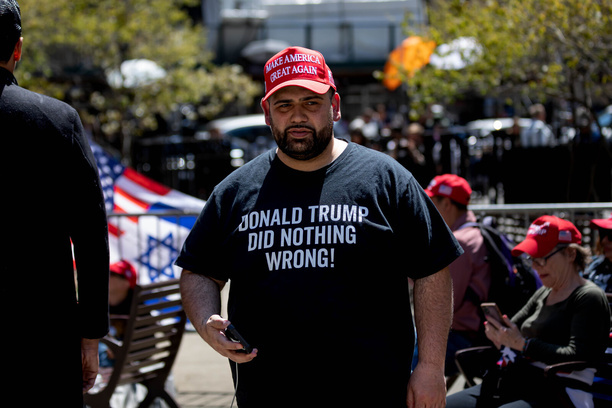 Supporters and protesters of former U.S. President Donald Trump gather outside the Manhattan Criminal Court on the first day of his hush money trial. Trump is in court for a high-stakes hearing charged by Manhattan District Attorney Alvin Bragg with 34 counts of falsifying business records to disguise hush money payments to a porn star before the 2016 election. 