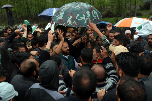 Despite the pouring rain, a crowd of dedicated individuals stood patiently in Zaigigam Pulwama, eagerly awaiting the arrival of their esteemed leader, Mehbooba Mufti & Waheed ur Rehman Parra & The weather could not dampen their spirits as they gathered to show their support and admiration for the prominent figure. The scene was a testament to the unwavering loyalty and respect the community held for their beloved leader, braving the elements to welcome her with open arms. As the rain continued to fall, their determination and anticipation only grew stronger, creating a powerful and touching display of solidarity and unity in Pulwama today ongoing lok sabha election campaign