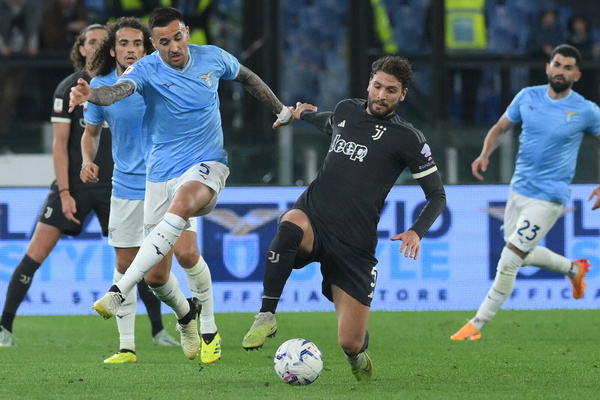 Matías Vecino of SS Lazio competes for the ball with Manuel Locatelli of Juventus FC during the Semi-final Second Leg - Coppa Italia match between SS Lazio vs Juventus FC  at Olimpic Stadium on April 23,2024 in Roma, italy Final score 2-1