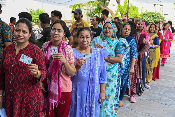 People cast their votes during the second round of voting in the six-week-long national election.