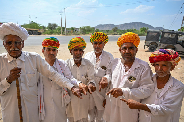 People casting their votes during the second phase of polling at Kishangarh village in Ajmer district in Rajasthan.