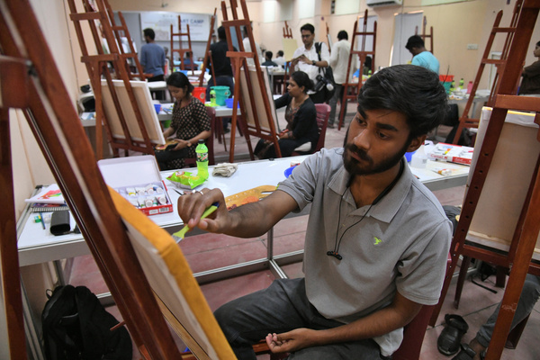 An artist making painting at the Art Workshop: From STEM to STEAM as the Birla Industrial & Technological Museum, Kolkata, celebrates its 66th foundation day with various public programs featuring Art Workshop: From STEM to STEAM, Gallery Quiz, and other interactive programs.