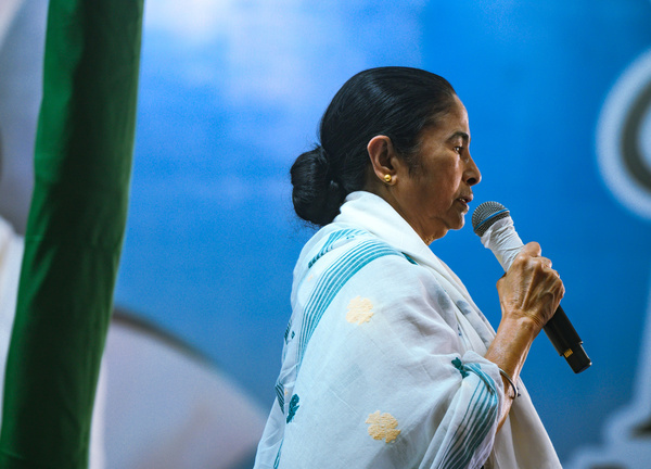 West Bengal's Chief Minister and the leader of the Trinamool Congress (TMC) party and one of the strongest faces of opposition in India, Mamata Banerjee, is speaking during a public meeting at an election campaign rally in support of Indian MP Mahua Moitra at the Harichand Guruchand Stadium giving an animated speech just before Prime Minister Narendra Modi arrives in Tehatta, West Bengal. This photo was taken at Betai, Tehatta, West Bengal.