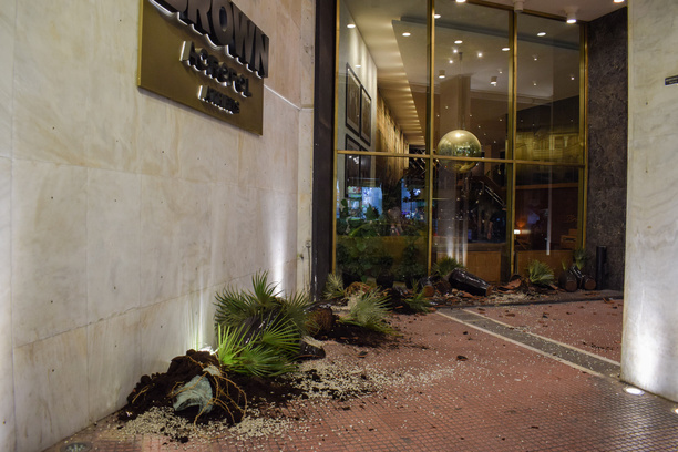 A view of damaged exterior of a hotel in the city, with smashed glass, damaged plant pots and other debris from inside the lobby is seen following a pro-Palestinian demonstration against Israeli actions in Rafah.