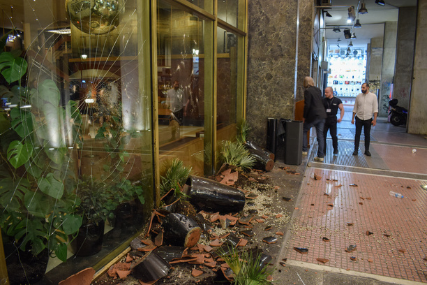 A view of damaged exterior of a hotel in the city, with smashed glass, damaged plant pots and other debris from inside the lobby following a pro-Palestinian demonstration against Israeli actions in Rafah.