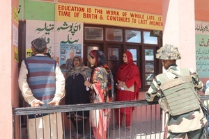 Women voters wait to cast their votes during Lok Sabha Srinagar Parliamentary Constituency election, in a Arigam hamlet in Tral, hometown of Burhan Wani who was poster boy of Kashmir, on Monday 13 May. This is the first major election being held in Jammu and Kashmir after the abrogation of Article 370 and the bifurcation of the erstwhile state into two union territories of Jammu and Kashmir and Ladakh in 2019.