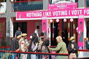 Kashmiri men and women take part in Lok Sabha Srinagar Parliamentary Constituency election on Monday 13 May. This is the first major election being held in Jammu and Kashmir after the abrogation of Article 370 and the bifurcation of the erstwhile state into two union territories of Jammu and Kashmir and Ladakh in 2019.