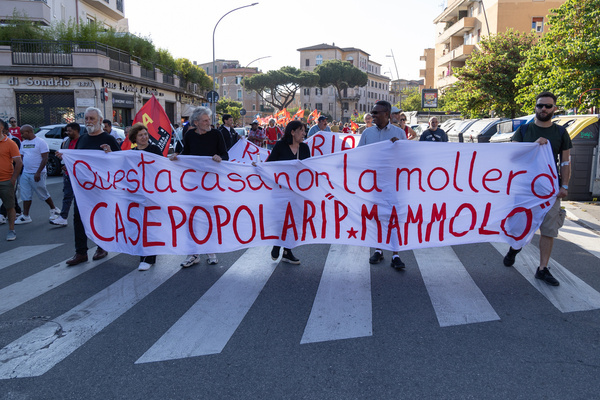 Demonstration in the streets of Garbatella district in Rome organized by movements for the right to housing
