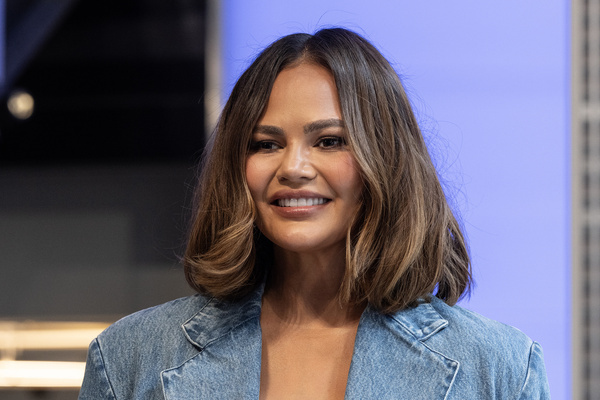 Chrissy Teigen visits Empire State Building in New York to light up to celebrate JBL Fest and partnership with NAMM.
