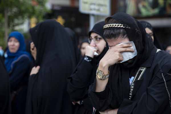 A woman weeps during a mourning ceremony for Iranian President Ebrahim Raisi at Vali-e-Asr Square in downtown Tehran, Iran, on Monday, May 20, 2024. President Raisi and the country's foreign minister, Hossein Amirabdollahian, were found dead Monday hours after their helicopter crashed in fog.