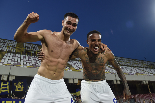 Michael Folorunsho of Hellas Verona FC and Diego Coppola of Hellas Verona FC they rejoice at the end of the match for staying in Serie A during the Serie A match between US Salernitana 1919 vs Hellas Verona FC at Arechi Stadium on May 20,2024 in Salerno, italy Final score 1-2