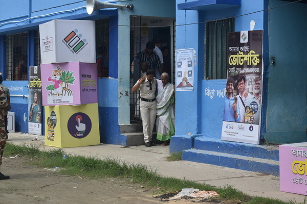 People cast their votes in polling booths during the seventh phase of the Lok Sabha election in Kolkata.