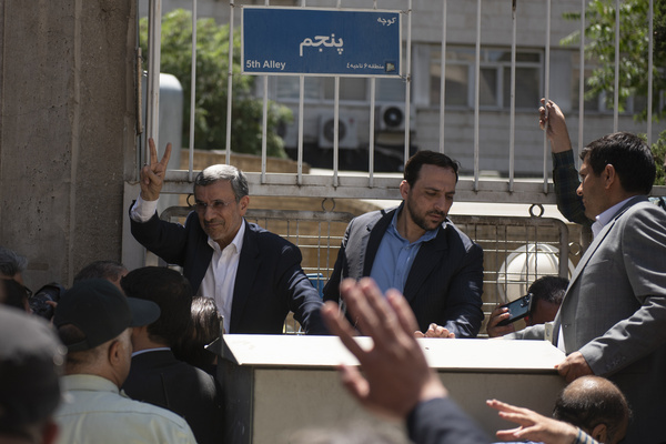 Mahmoud Ahmadinejad, the former president of Iran, flashes a victory sign to his supporters after registering his name as a candidate for the June 28 presidential election at the Interior Ministry in Tehran, Iran, Sunday, June 2, 2024.
