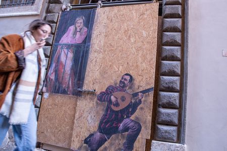 View of new mural created in Rome in Vicolo degli Osti by the artist TvBoy, entitled "La Serenata"