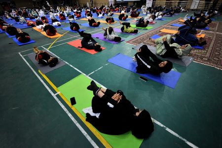 Participants perform Yoga exercises to mark "Yogotsav" in Srinagar in connection with countdown to International Yoga Day-on June 21, 2023.