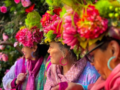 A participant is wearing flowery hat in the annual Easter Parade and Bonnet Festival along Fifth Avenue on Easter Sunday on April 9, 2023 in New York City.