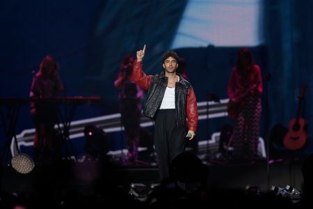 MADRID, SPAIN - OCTOBER 21: The Spanish singer and composer Alvaro de Luna (Seville, 1994), trained as a sound technician, rose to fame in 2017 with the musical group in which he was a vocalist and composer, “Sinsinati”, after this experience, in 2020 he began his solo career with his first single 'Juramento eterno de sal', a song that has accumulated more than 22 million views on YouTube, is seen on stage on Saturday, October 21, 2023, during his participation in the 'Cadena 100. Por ellas' concert, which this year celebrates its tenth anniversary, at the WiZink Center, in Madrid (Spain). The 'Cadena 100. Por ellas' concert returns one more year to the WiZink Center to raise funds for cancer research with a line-up of top artists such as: Chanel, Vicco, Rozalen, Edurne, Lorena Gomez, Alvaro de Luna, Nil Moliner, Sergio Dalma, Beret & Mr. Rain, Conchita and Alvaro Soler have come together to give voice to a night full of emotion, already converted into the great event to support all those people who have fought or are fighting against the disease. At the same time, Iñigo Quintero, the young man from La Coruña who is breaking records on Spotify and on social networks, made his debut on stage performing his hit 'Si no estas'. Last year, the Spanish Association Against Cancer allocated 17 million euros for 79 research projects. This year it is expected to reach 26 million, with a goal for 2030 of exceeding 70 percent cancer survival, because not all cancers have as high a survival rate as breast cancer. A challenge, in which initiatives such as 'Cadena 100. Por ellas' are important and help to continue adding to the fight against cancer. (Photo by Hugo Ortuño)
--
MADRID, ESPAÑA - OCTUBRE 21: El cantante y compositor español Álvaro de Luna (Sevilla, 1994), de formación técnico de sonido, saltó a la fama en el año 2017 con el grupo musical en el que era vocalista y compositor, 'Sinsinati', luego de esta experiencia, en el año 2020 comenzó su carrera en s