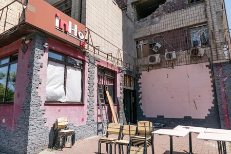 View of the destruction of a building and In-house café on Lobanovskyi avenue in Kyiv by Russian drone