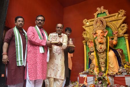 West Bengal Sports Minister Aroop Biswas and Gopi Thakkar,President of Ganesh Bhakti Mandal infront of an idol of the elephant-headed Hindu deity Lord Ganesha during the 'Ganesh Chaturthi' festival in Kolkata on September 19, 2023.