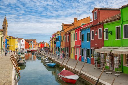 Burano is a small island in the Venice lagoon, famous for its Lace and its colorful houses.