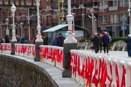 Hundreds of red ribbons on the wall of San Lorenzo beach in celebration of International AIDS Day.