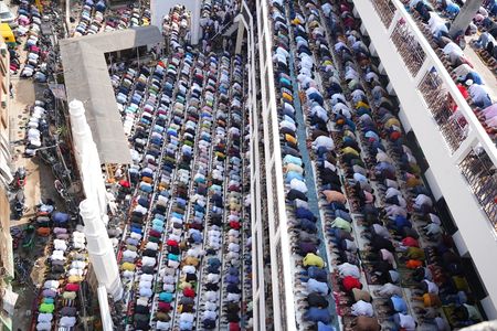 Indian Muslim men offer prayers on the first Friday of Islamic holy month of Ramadan.