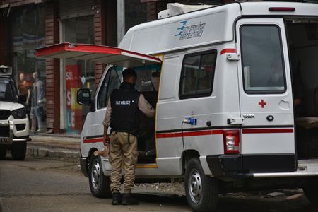 Luggage checking by security agencies at a newly renovated market ahead of a visit by G20 delegates in Srinagar, Indian controlled Kashmir, Wednesday, May 24, 2023. Delegates from the Group of 20 leading rich and developing nations are in Indian-controlled Kashmir for a meeting on tourism that began Monday.