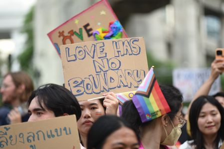 People march with placards and Rainbow flag join event "Bangkok Pride 2023" event, on June 4, 2023. with participants marching, from The Pathumwan intersection, Rama 1 Road to Ratchaprasong intersection before entering the CentralWorld.