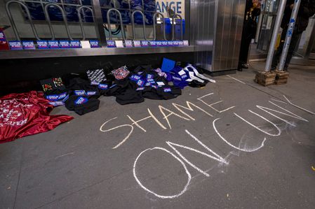 Graduation caps and gowns are left on the sidwalk outside the CUNY Chancellors Office during a protest of Israel's unrelenting bombing of civilians in Gaza on December 5, 2023 in New York City.  Pro-Palestine activists joined alumni and students, some dressed in caps and gowns, for a "Denouncement Ceremony" advocating for all alumni to pressure the administration to end its silence in the ongoing war between Israel and Hamas. Protests for a permanent ceasefire continue across the globe while Israel escalates its military siege in the southern part of the Gaza Strip. More than 15,000 Palestinians, including more than 6,000 children and 4,000 women, have been killed according to health authorities in the enclave.