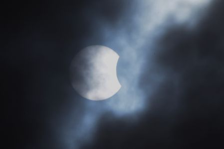 Australian people watching a partial solar eclipse at St. Kilda beach Melbourne. In Yogyakarta, Indonesia. Eclipse will be visible in some form across Australia and Indonesia, and in parts of New Zealand, Vietnam, the Philippines and Papua New Guinea.