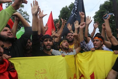 Kashmiri Shiite mourners attending the Muharram procession in the City Centre in Srinagar, the summer capital of Indian-administered Kashmir, 27 July 2023. The authorities in Indian-administered Kashmir for the first time in over three decades allowed the processions from the City Centre on 8th Muharram, the first month of the Islamic lunar calendar. The Muharram processions were banned from the City Centre in 1989 at the outbreak of armed insurgency in the region although Shiites used to bring out processions within localities and in the peripheries.